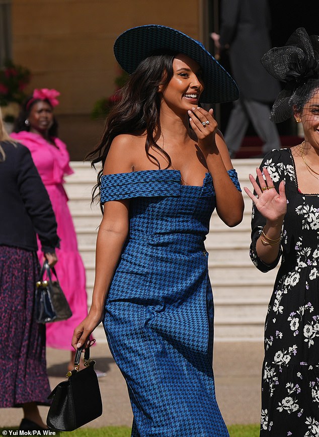 Maya looked amazing in a blue printed dress. Leaving her long dark tresses loose in waves, Maya wore a striking coordinating blue headpiece.