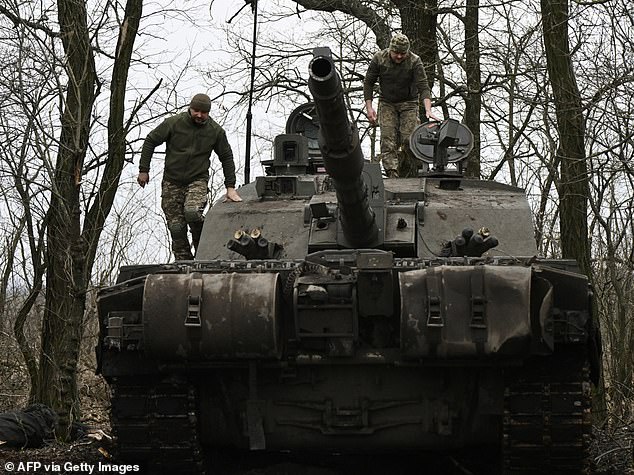 Ukrainian servicemen of the 82nd Separate Air Assault Brigade prepare for combat with the Challenger 2 tank at an undisclosed location near the front line in the Zaporizhzhia region.