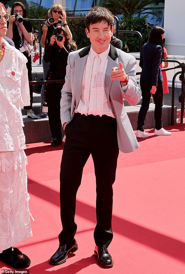 Keoghan looked suitably dapper in a Burberry shirt, tuxedo jacket and trousers as he greeted onlookers in the south of France on Thursday.