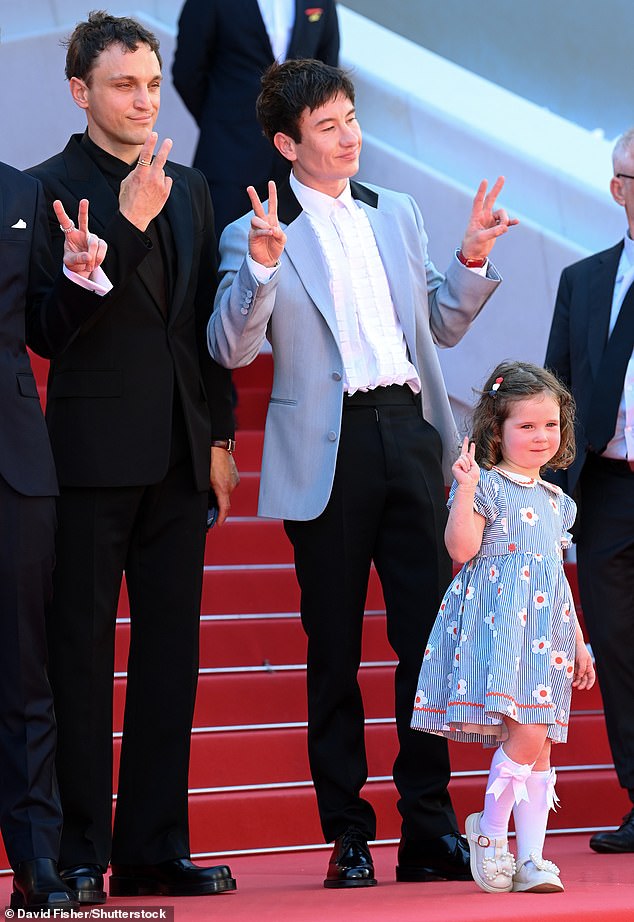 Bird's co-stars Franz Rogowski, Barry Keoghan and Nykiya Adams offered peace signs to the assembled press as they posed on the steps of the Croisette.