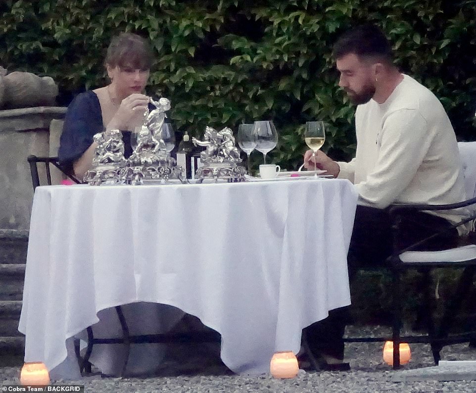 The couple's dinner scene looked like something out of a movie as they chatted over dinner.