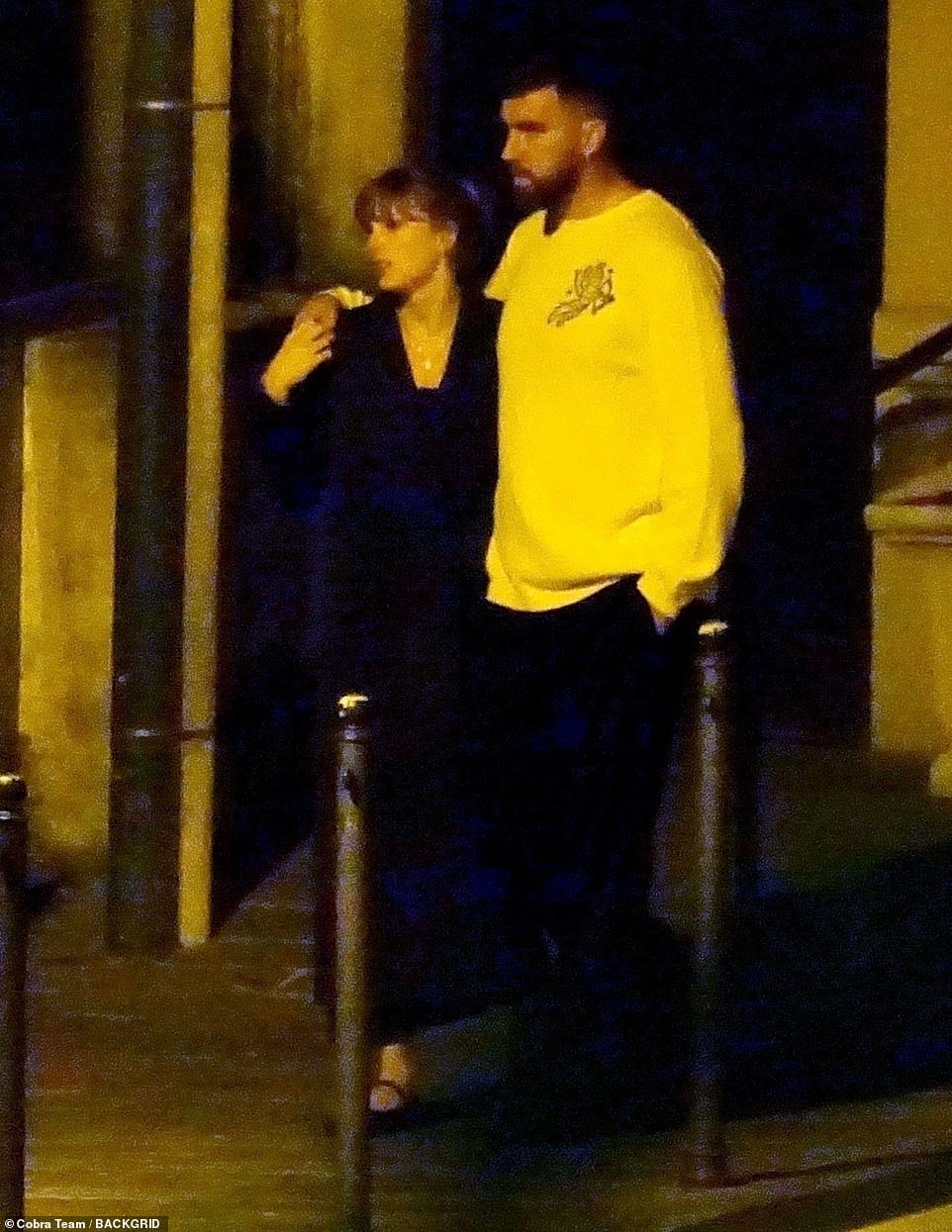 Taylor and Travis looked loved up during their moonlight stroll.