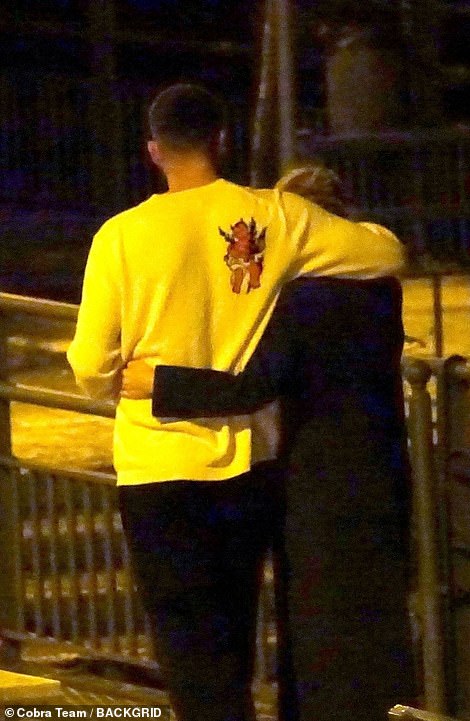 The couple hugged each other while strolling through Italy.