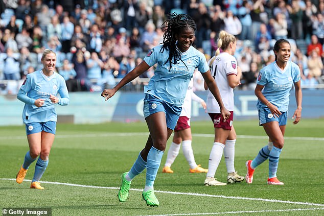 City's Bunny Shaw (centre) took the top women's award in a double victory for the club.