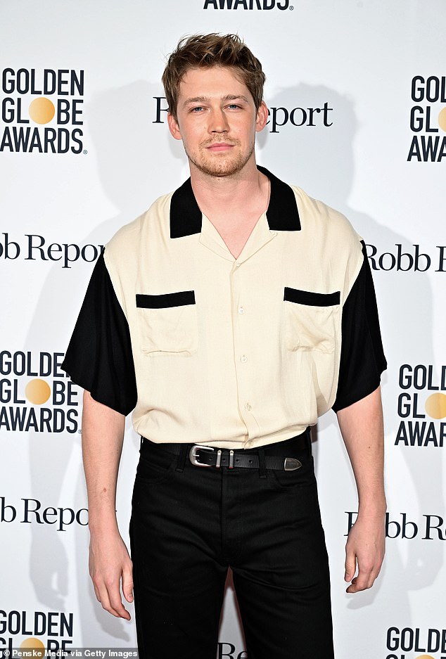 Joe didn't seem fazed by the recent controversy as he attended the Golden Globes and Robb Report party wearing a stylish black and white shirt.