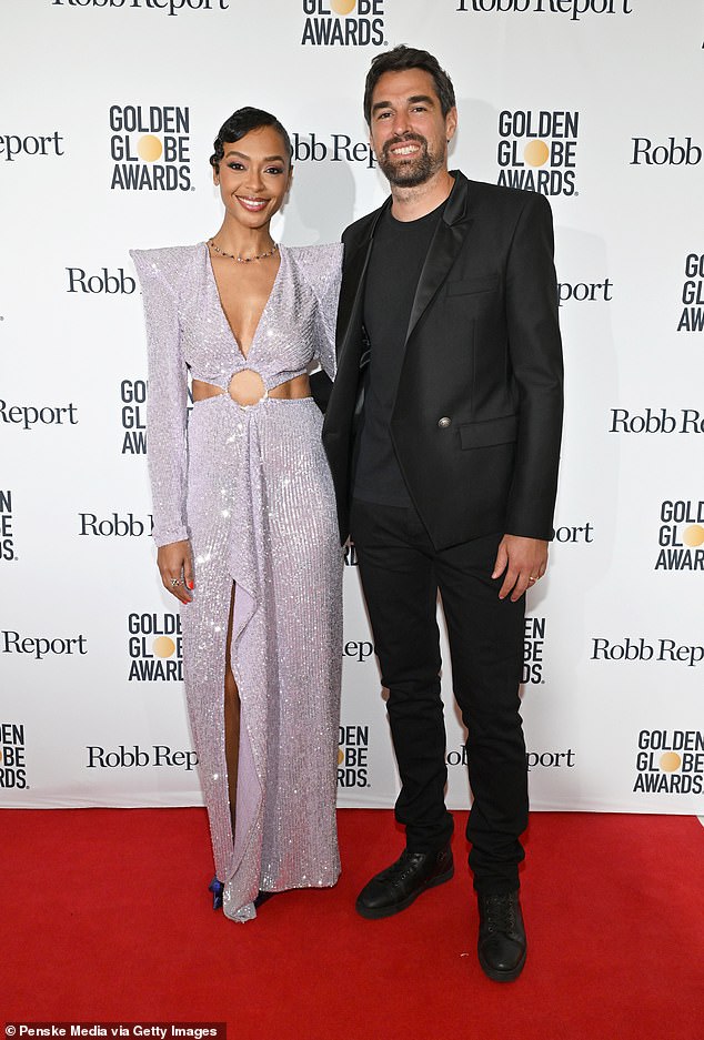 She looked great in the stunning dress as she posed with French professional tennis player Jeremy Chardy.