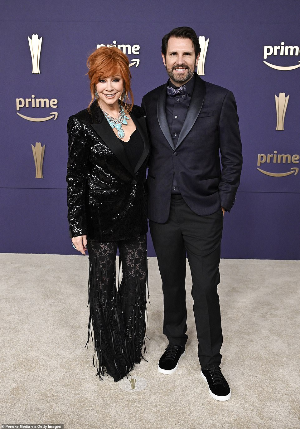 Reba posed for a photo with Academy of Country Music CEO Damon Whiteside before the show.