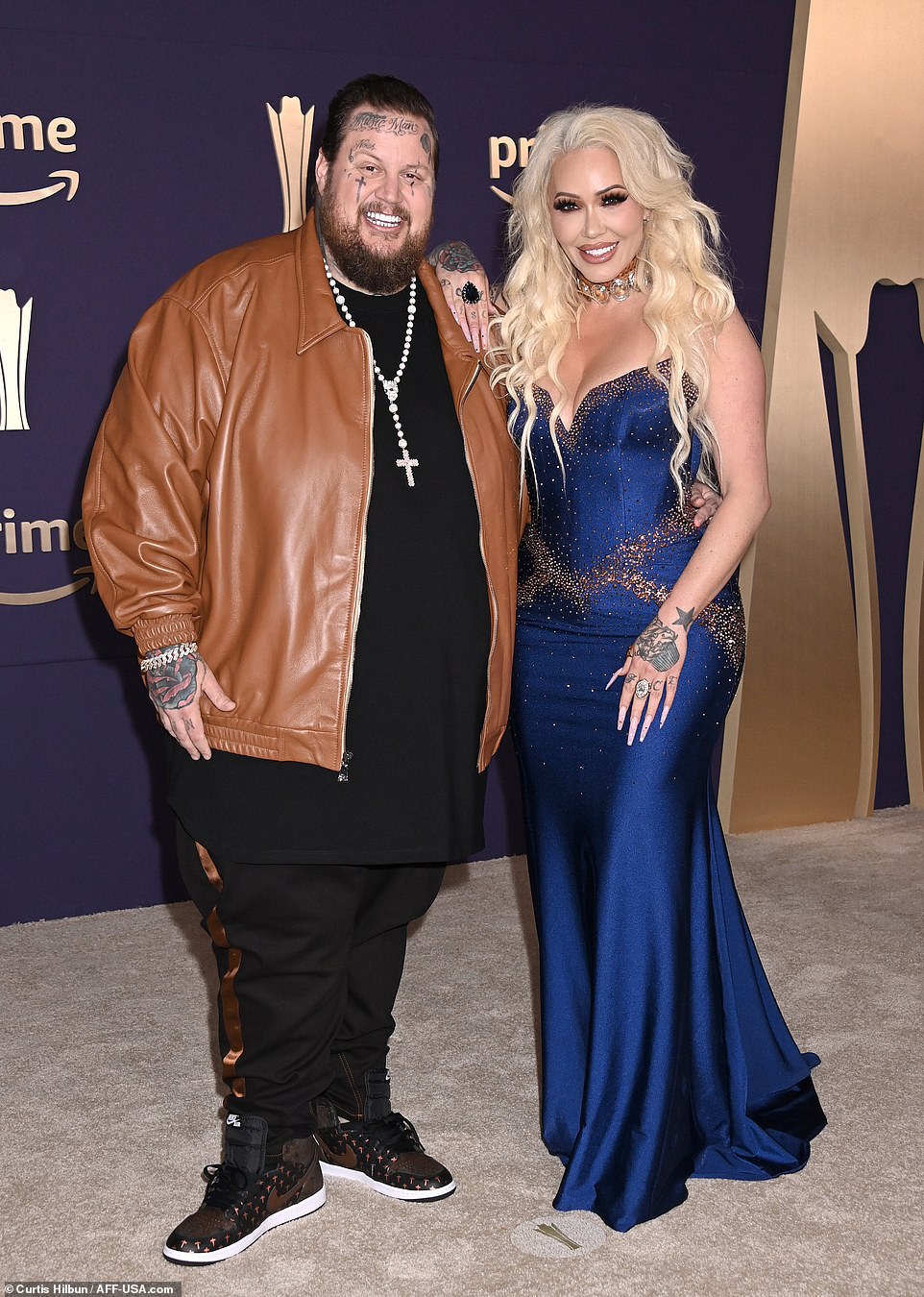 Jelly Roll, who has four nominations at the 2024 ceremony, made his PDA with his blonde bombshell wife Bunnie Xo.