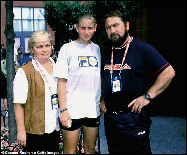 Jelena, 41, has long been open about the suffering she endured at the hands of her father, writing in her book Unbreakable that he inflicted regular beatings on her with a belt or a hard boot, and once knocked her unconscious. [L-R] Liliana Dokic, Jelena and Damir in 1999