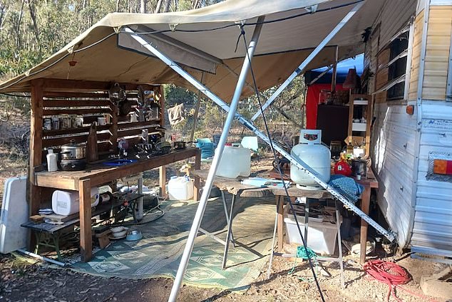 The friends argue that it's not just a campsite: they have dry storage, a functional outdoor kitchen (pictured), solar power and waste containment systems.