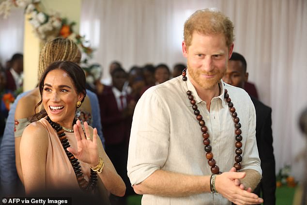 Meghan and Harry arrive at the Lightway Academy in Abuja on May 10, 2024 as they visit Nigeria as part of the Invictus Games anniversary celebrations.