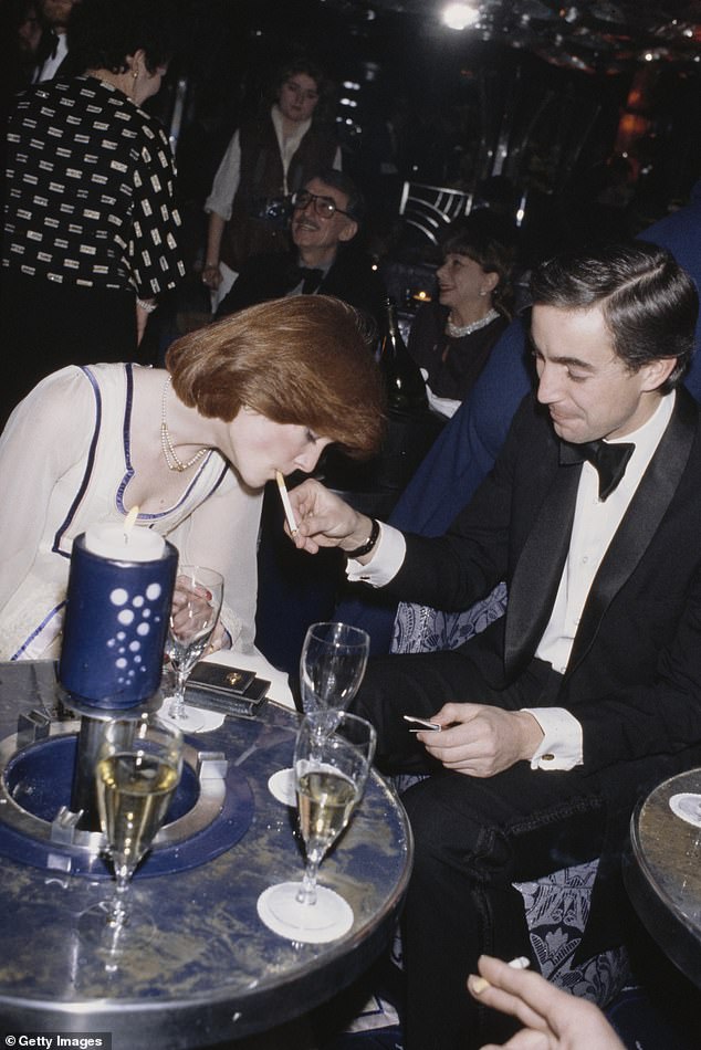 Sarah is known for her love of cigarettes, seen here on Kensington Roof Gardens in 1979.