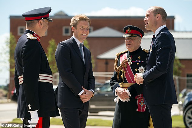 Prince William (R) is greeted by General Timothy Granville-Chapman (2R), Hugh Grosvenor, the Duke of Westminster (2L) and John Peace (L) as he arrives to attend the official handover of the National Defense and Rehabilitation Center .