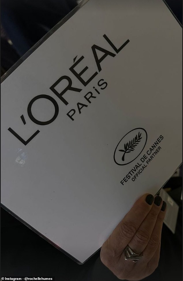 When she arrived at the Festival, Rochelle grabbed a Loreal brand sign, letting her fans know she was there to represent the company she has worked with for a long time.