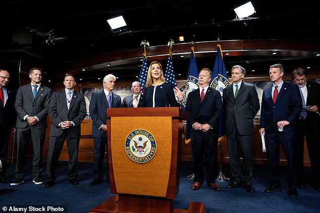 Rich McCormick photographed smiling at Van Duyne during a news conference at the Capitol last June.