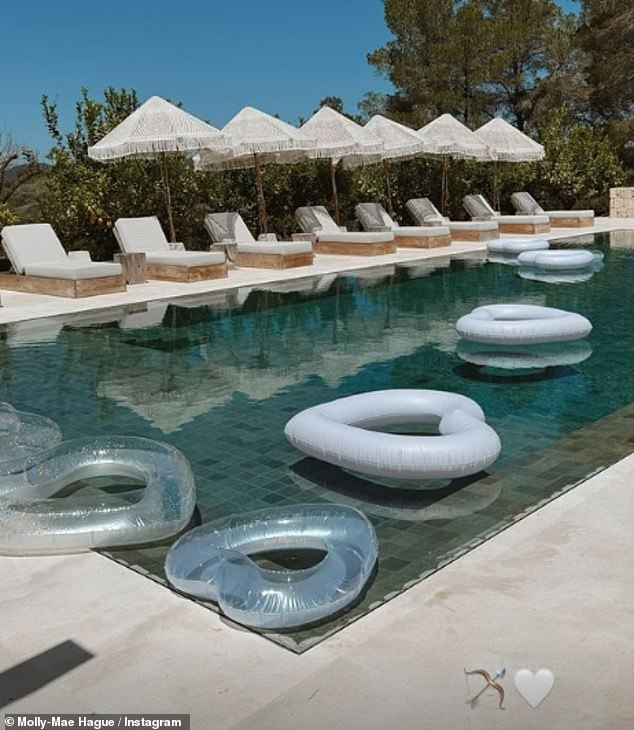 Paying close attention to detail, Molly-Mae revealed that she had filled the pool with heart-shaped inflatable rings following the theme of love.