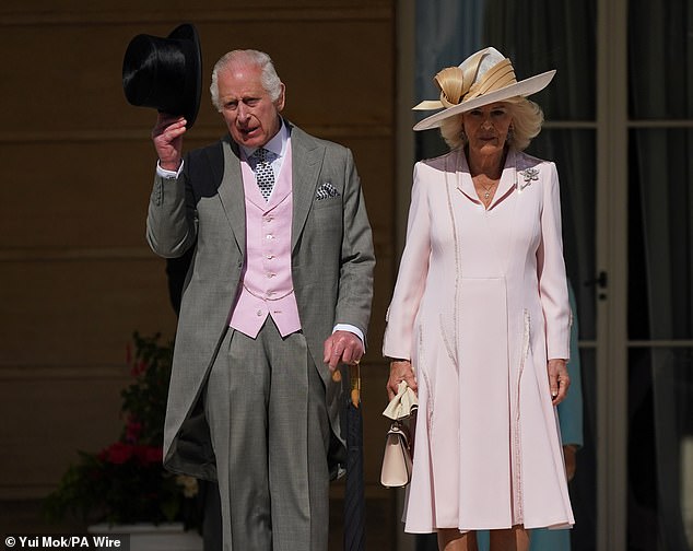 Charles and Camilla attend a garden party at Buckingham Palace in London on Wednesday.