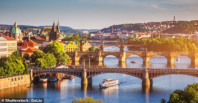 The train arrives in the heart of Prague (above) on time, without waiting at the baggage carousel