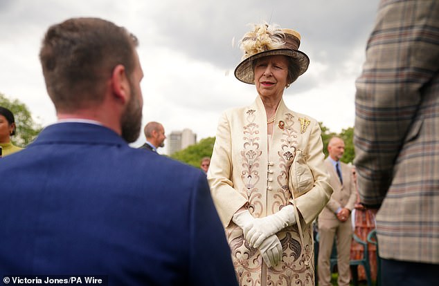 The princess also sported two dazzling gold brooches which she fastened to the left of her chest.