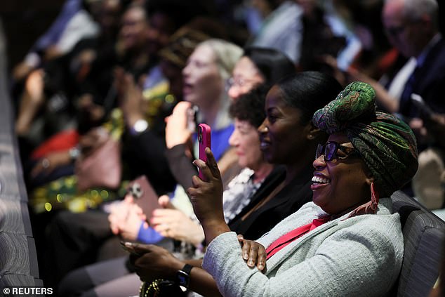 Audience members at the National Museum of African American History and Culture listen to President Joe Biden's speech.