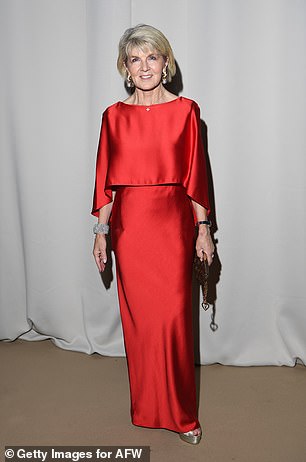 Ms Bishop made a statement in a striking red dress while attending Carla Zampatti's runway event on Monday.