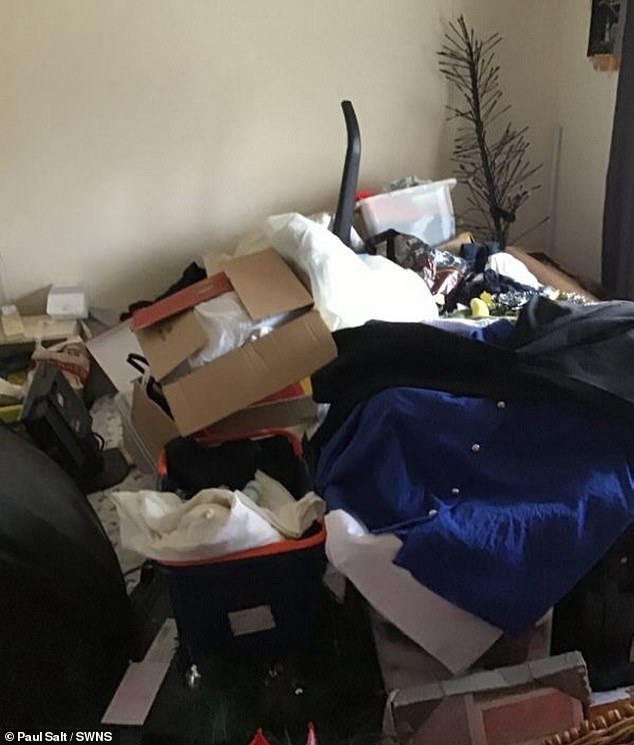 The retired school janitor, nicknamed 'Skip Man' for never being able to walk past a bin, said living alone allowed his collection to get out of control (pictured: Paul's guest room before it was cleaned out) .