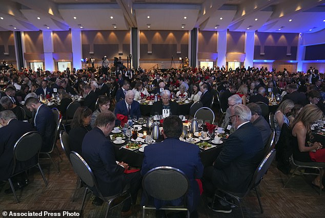 People sit at the Lincoln Reagan Republican Dinner in Minnesota on Friday, before Trump speaks