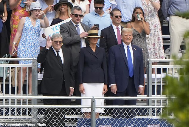 Donald Trump, with Melania Trump and his father, Viktor Knavs, at his son Barron's graduation ceremony at Oxbridge Academy on Friday in West Palm Beach, Florida.