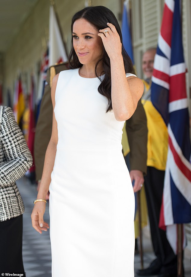 In Australia she wore this simple shift dress by local designer Karen Zee, which was both regal and relaxed and wouldn't have looked out of place during a wedding ceremony.