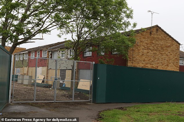 Pictured: Abandoned buildings cordoned off awaiting demolition.