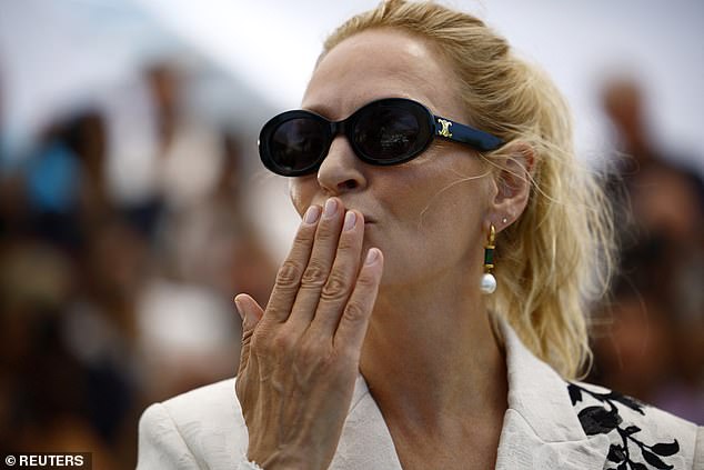 Uma, whose blonde locks were pulled back into a ponytail, blew a kiss to those in attendance.