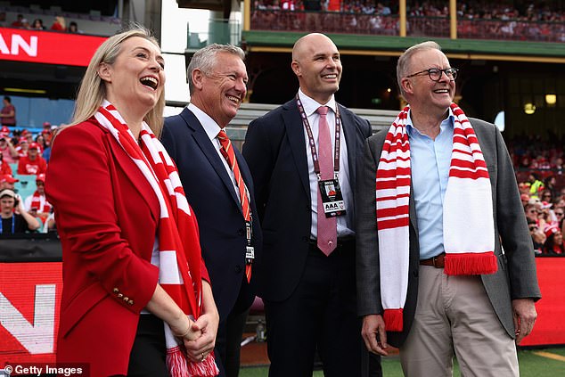 Pictured, left to right, Anthony Albanese's fiancee Jodie Haydon, Suns chief executive Mark Evans, Swans chief executive Thomas Harley and Australian Prime Minister Anthony Albanese at the SCG, on April 21, 2024, in Sydney.