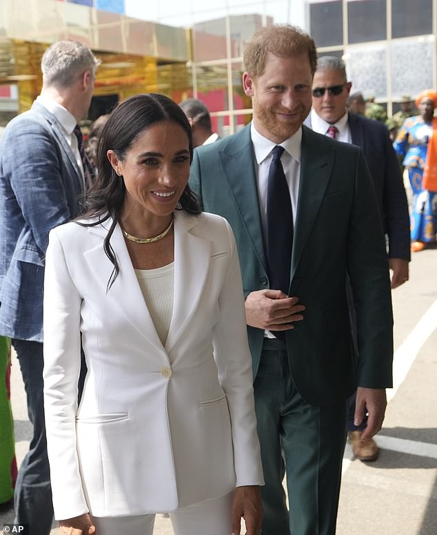 On May 10, Meghan was seen wearing the AURate necklace with an elegant white suit.