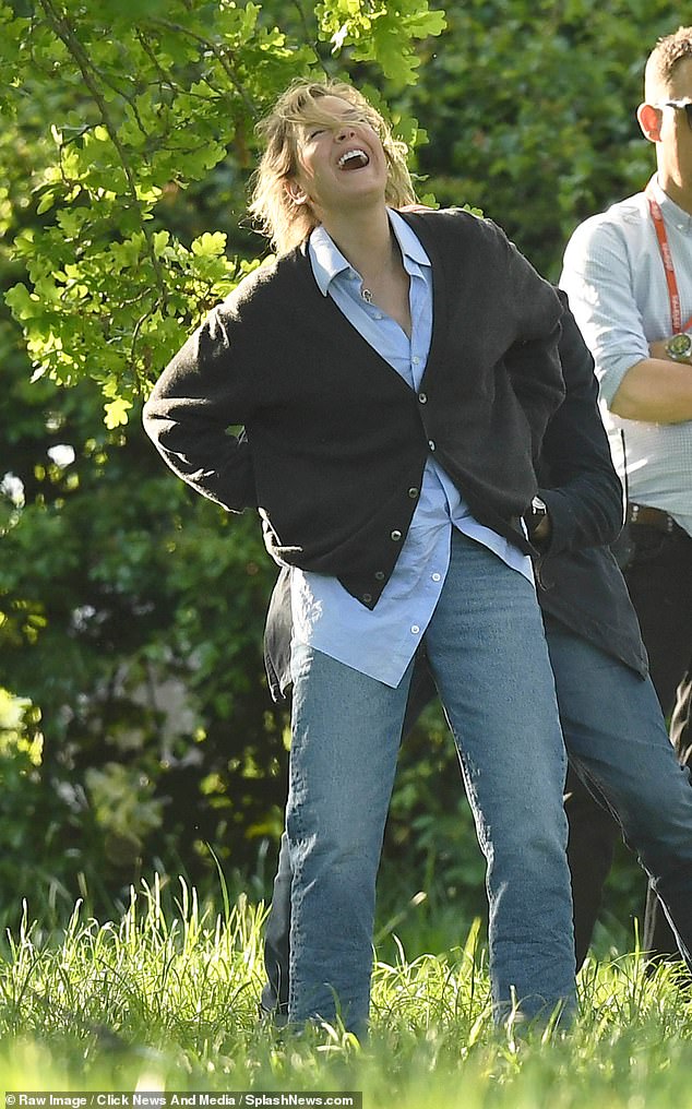 Mrs. Zellweger laughs out loud after climbing down from the tree during the filming of the new film.