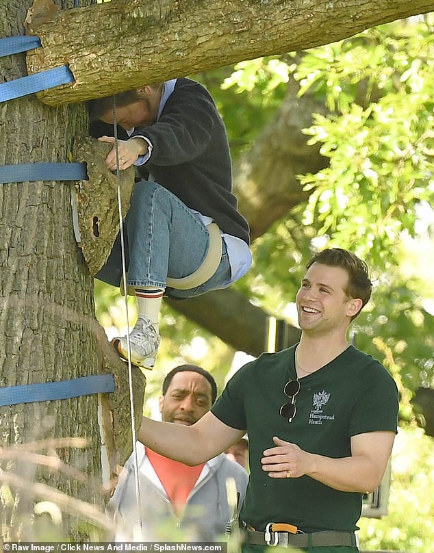 Leo Woodall's character, Bridget's Rockstar toymaker, offers to help her get her down from the tree.