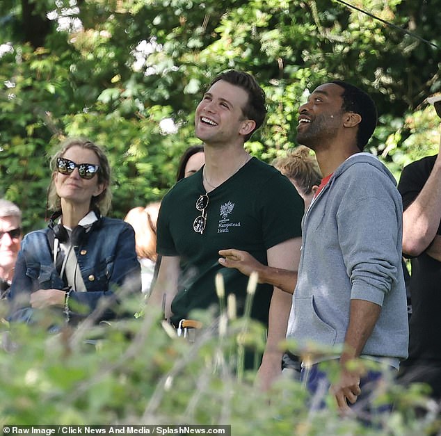 Co-star Chiwetel Ejiofor and Woodall appear to laugh at Ms. Zellweger while her character is stuck in the branches.