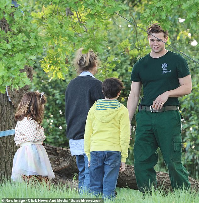 The fictional love interest was also seen talking to Bridget's two children after rescuing their mother from the tree.