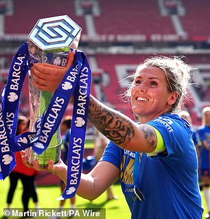 Bright raised the trophy in the air as he celebrated with Chelsea fans at Old Trafford.