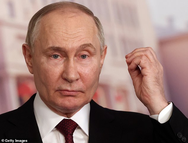 Vladimir Putin pictured yesterday at a press conference in China. Volkov insisted that there was no 