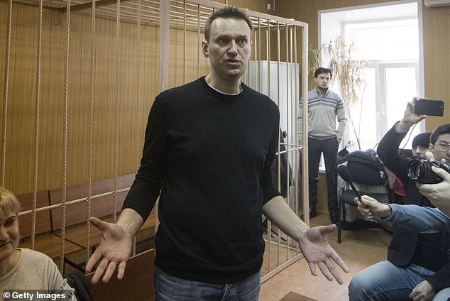 Volkov was a close ally of Alexei Navalny (pictured during his 2017 trial at Moscow City's Tverskoy Court) and worked as the late leader's former chief of staff and as president of his Anti-Corruption Foundation until 2023.