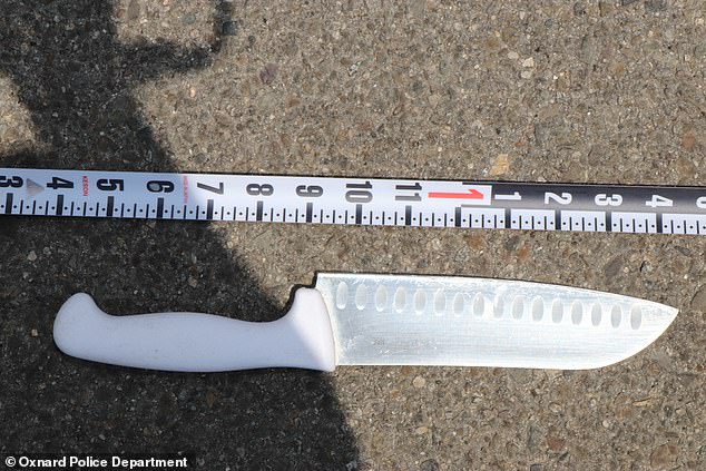 Police say the teen was armed with this 12-inch kitchen knife at the time of the incident.