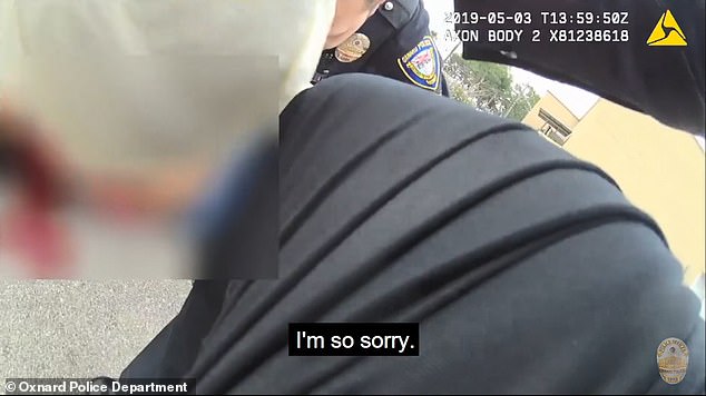 The girl repeatedly apologizes to police as she is treated for gunshot wounds.