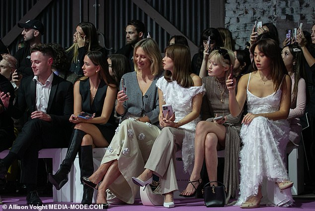 This year, the wild whispers and rumors heard in the front row of Sydney's Carriageworks and elsewhere were as sensational as the outfits hanging from the models as they strutted their slender figures down the catwalk (pictured: day three guests).