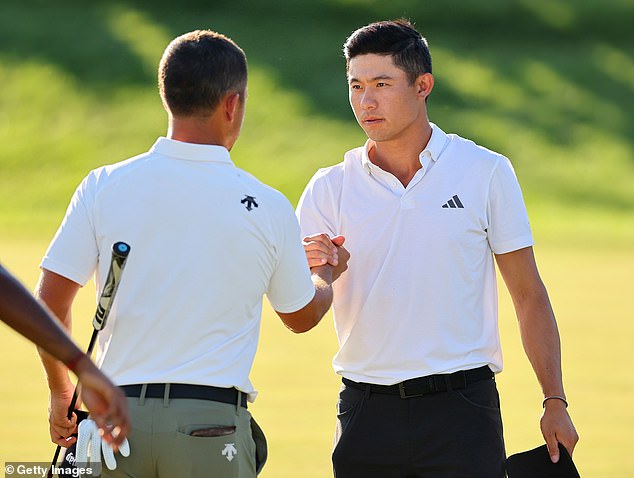 The American was joined at the top of the rankings by his playing partner Collin Morikawa (right)