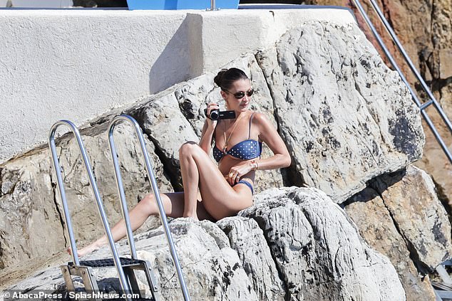 Bella was tanning while enjoying the trip to the south of France.