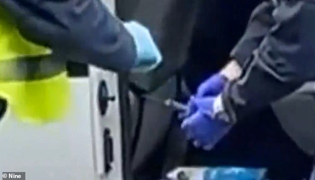 The man allegedly stabbed the police officer up to three times with a kitchen knife (in the center of the photo), about 30 cm long.