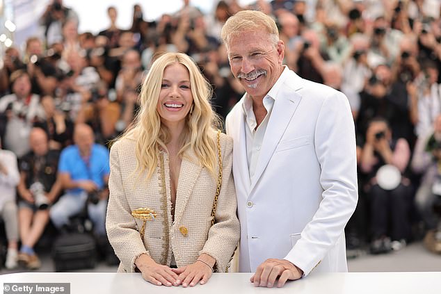 Meanwhile, Kevin, 69, cut a dapper figure in a white suit which he teamed with a matching open-necked shirt and beige shoes.