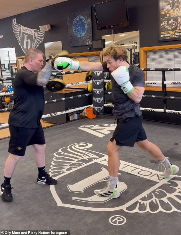 Meanwhile, last week, Olly met up with iconic boxer Ricky Hatton for a sparring session and shared a funny clip of the pair training, before the singer was wiped out.