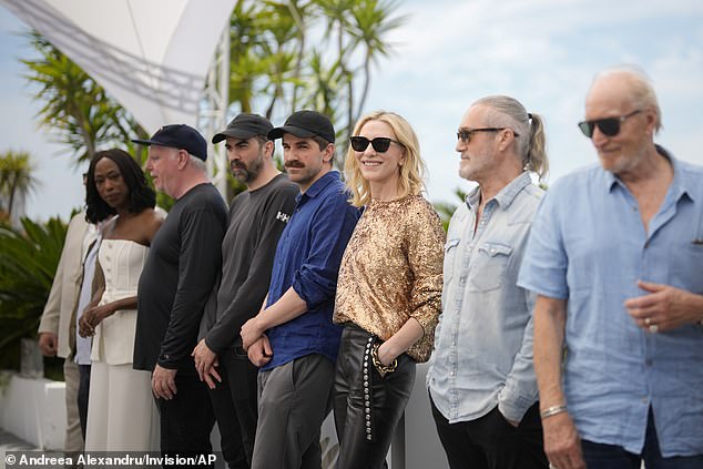 Director Guy Maddin, director Galen Johnson and director Evan Johnson pose with the film's stars.