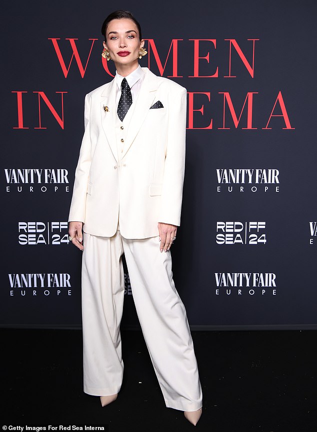 It comes after Amy stunned in a white suit and tie at the Women In Cinema Gala with the likes of Eva Longoria and Alessandra Ambrosia.